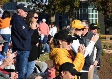 Families cheering on the Field Hockey team